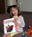 Tess loving her book